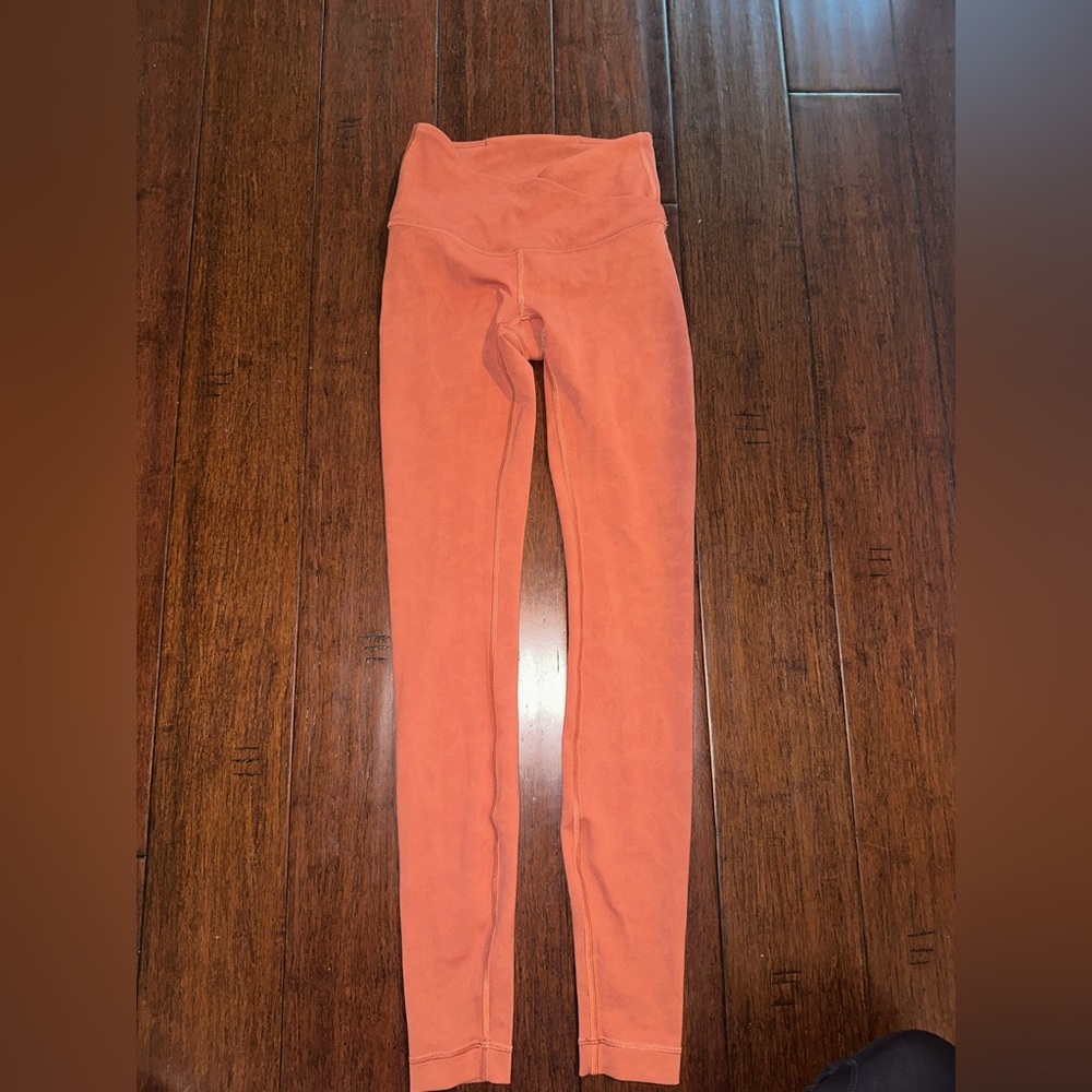 Burnt orange Lululemon leggings size 2, barely worn!!!!